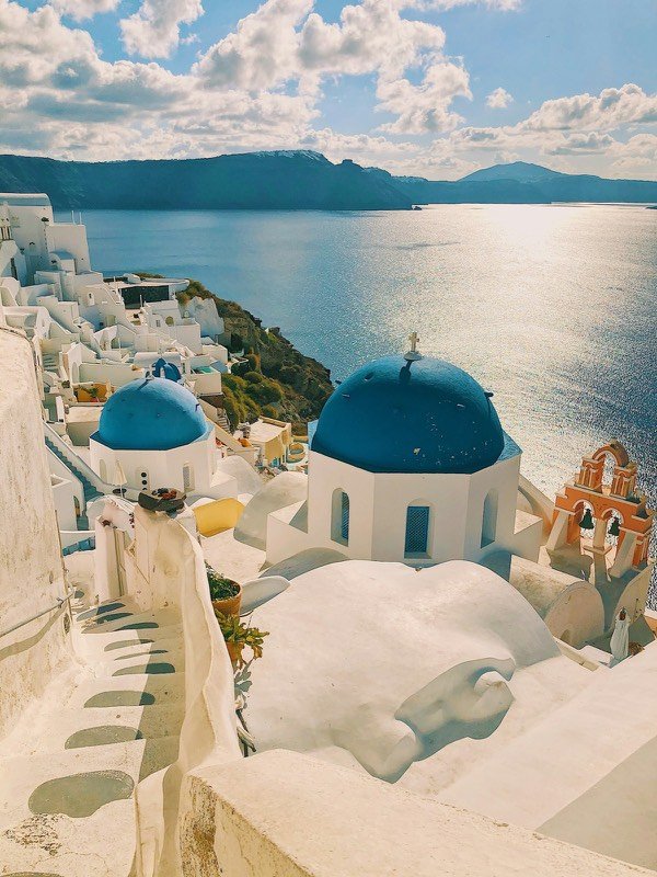 Blue-domed churches above the caldera in Santorini, Greece