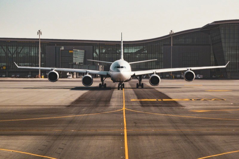 Airliner facing the camera on the airport tarmac before departure